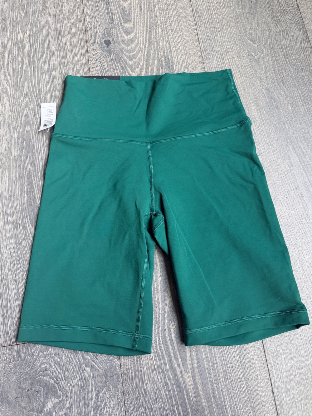 TnaLIFE Hi-Rise Cheeky 9" Short in Ivy League Green Size Medium